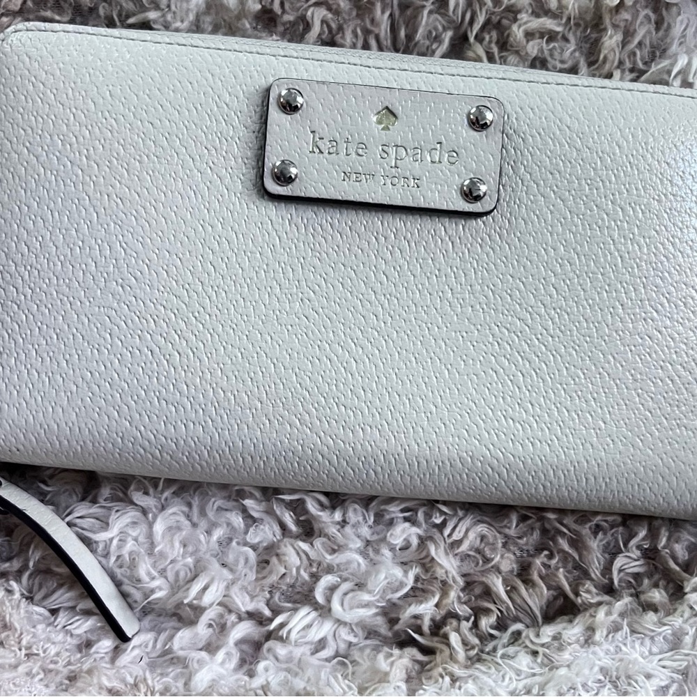 Woman’s Kate Spade Wallet.